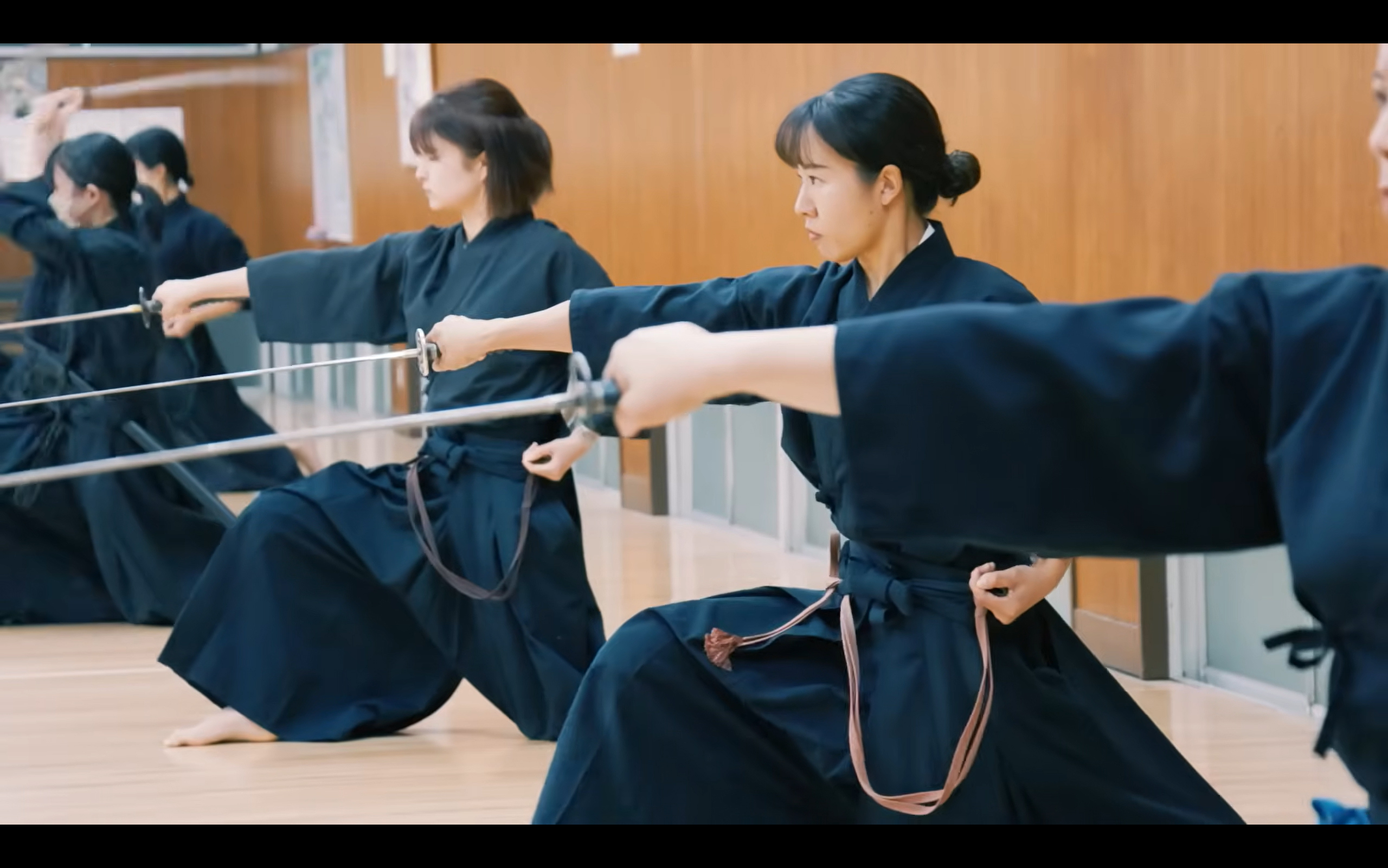 Students practising Iaido with swords